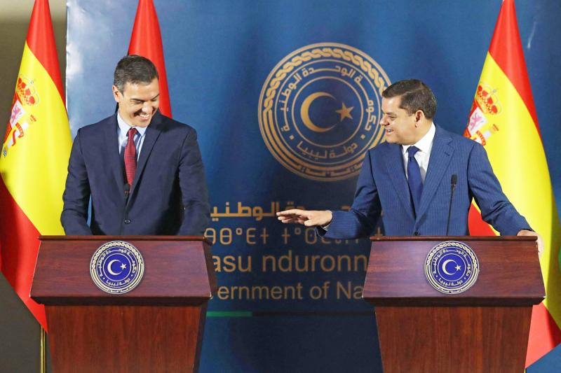 Spanish Prime Minister Pedro Sanchez (L) and his Libyan counterpart Abdulhamid Dbeibah speak during a press conference in the Libyan capital Tripoli on June 3, 2021. (AFP)