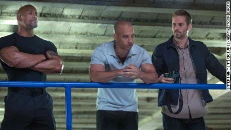 Dwayne Johnson, Vin Diesel y Paul Walker en la película & quot ;;  Furioso 6